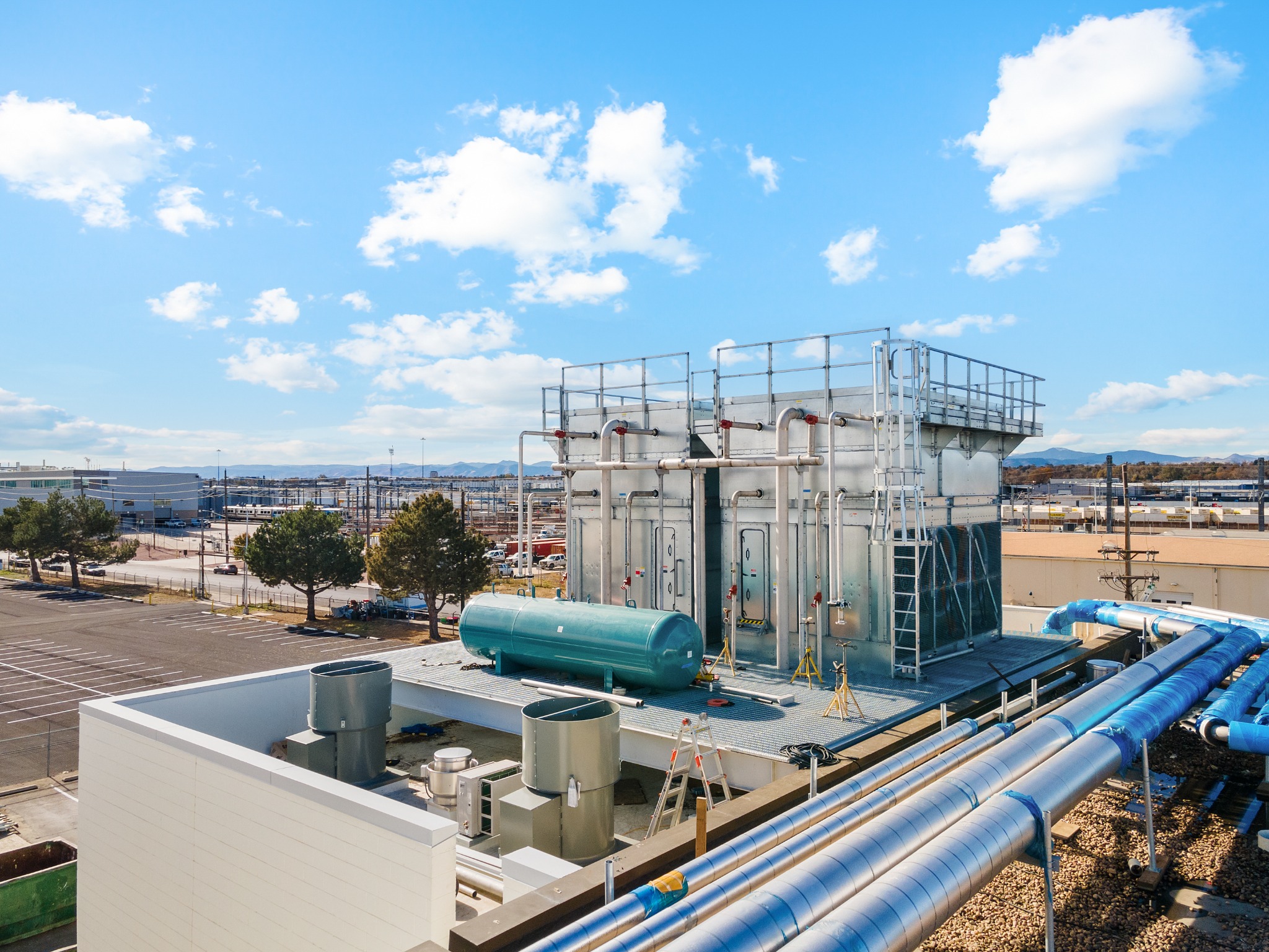 Industrial rooftop cooling equipment and blue piping