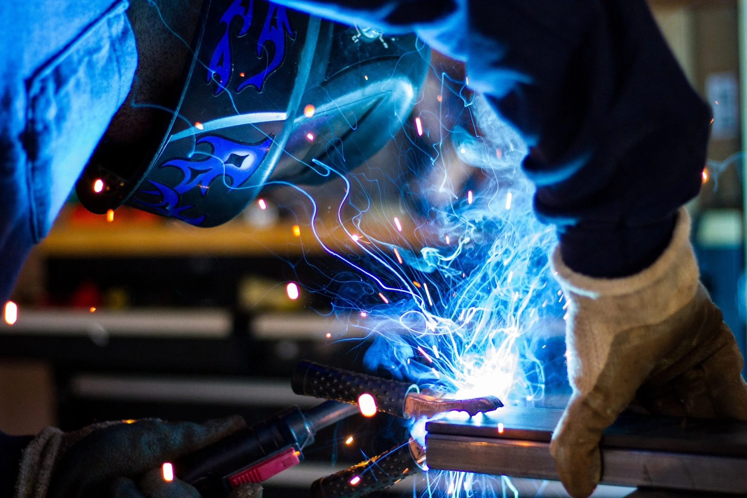 Certified welder fabricating pipe in the Commercial Welding shop in Commerce City, Colorado